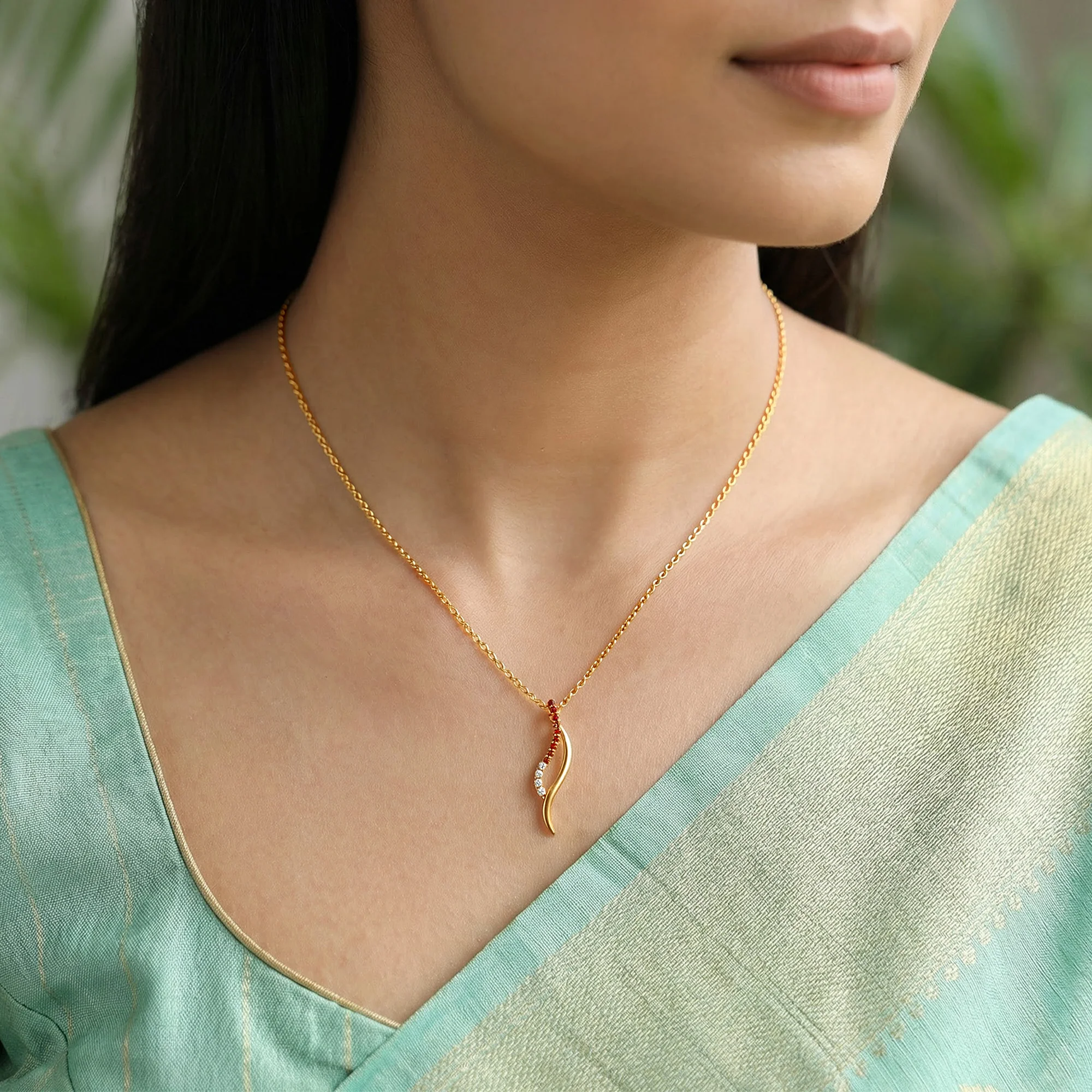 Golden Tanirika Pendant With Link Chain - Image 3