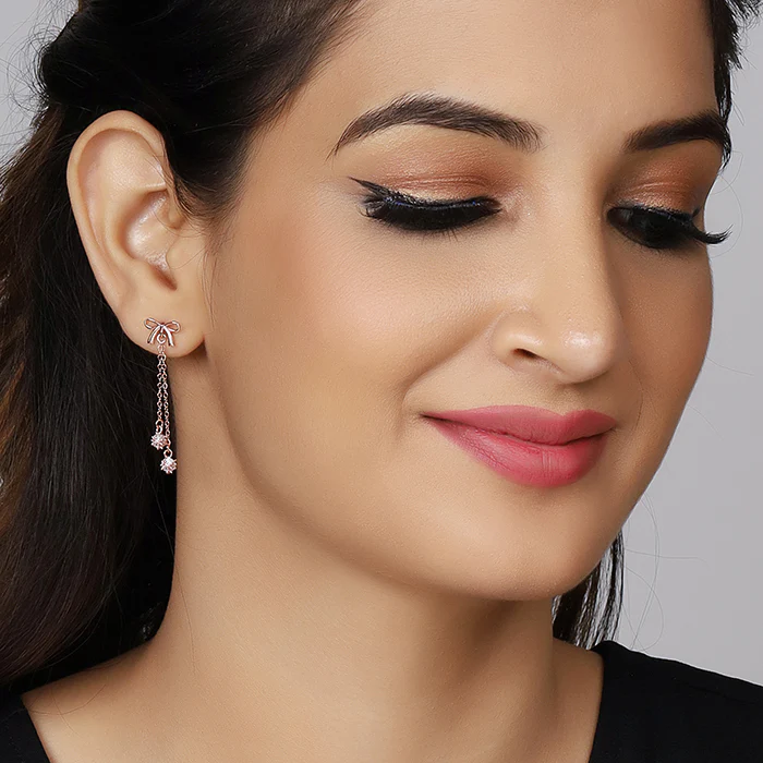 Rose Gold Bow Dangler Earrings - Image 2